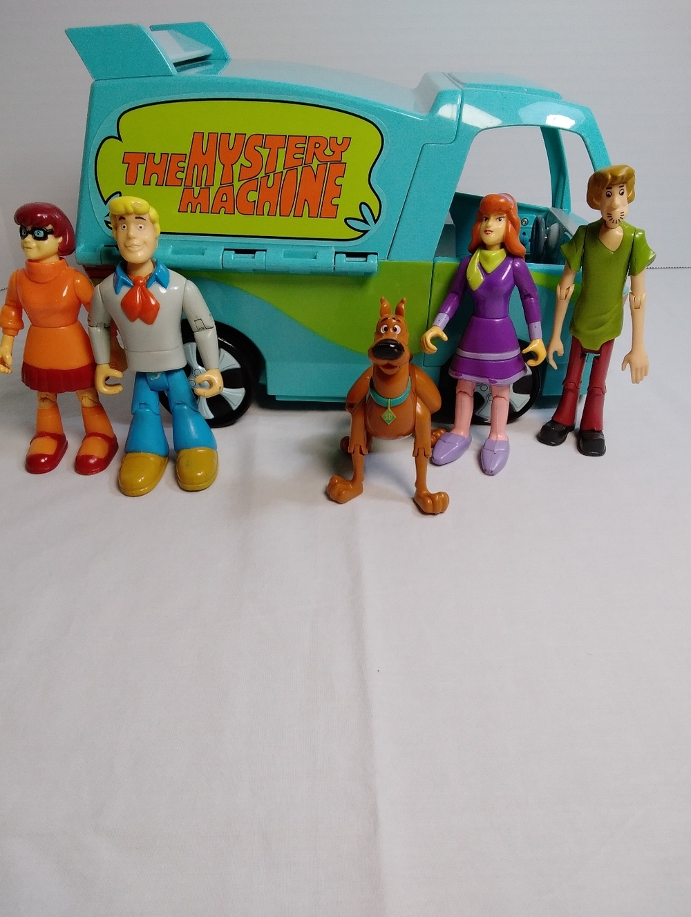 The Mystery Machine Kids Toy Playset with Teal Van and Character Figures